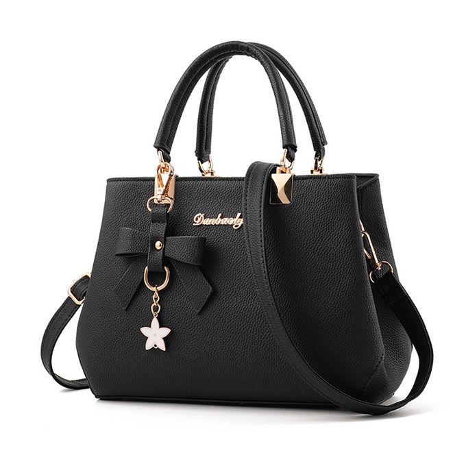 sac-a-main-reversible-noir.jpg sac a main reversible noir